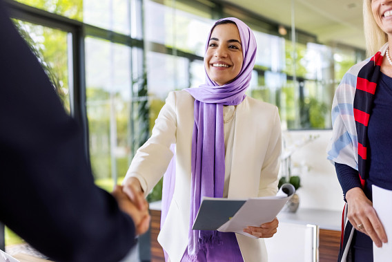 Business people greeting each other