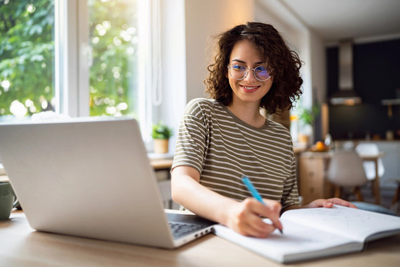 Student studying on laptop
